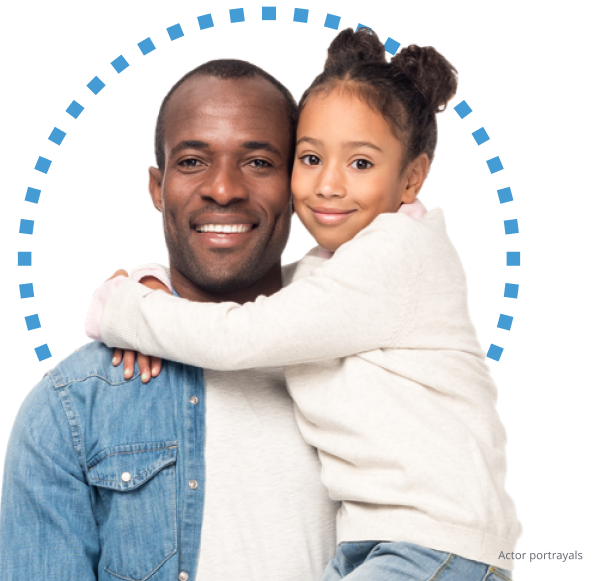 Father holding daughter and smiling